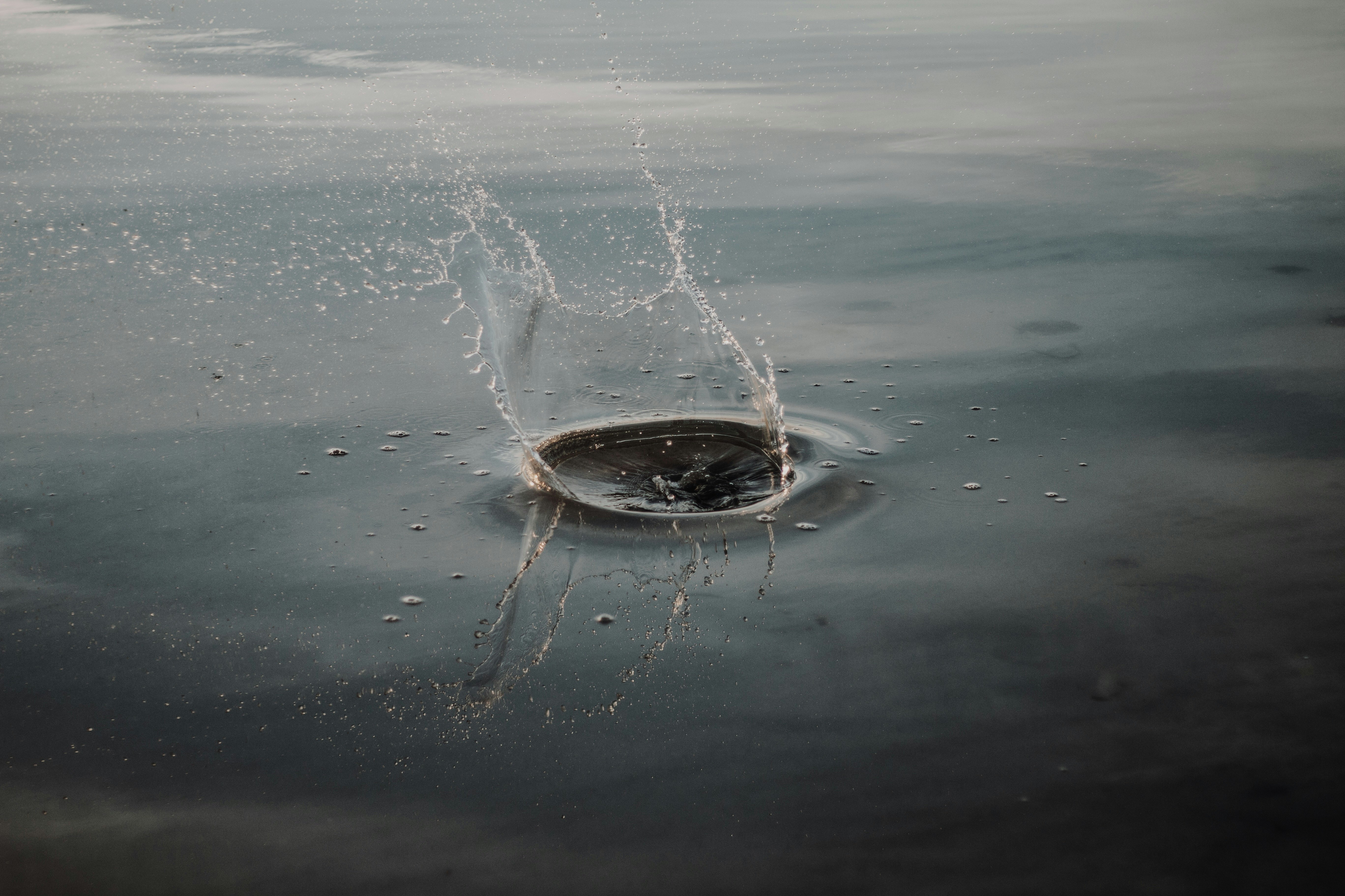 water splash on body of water